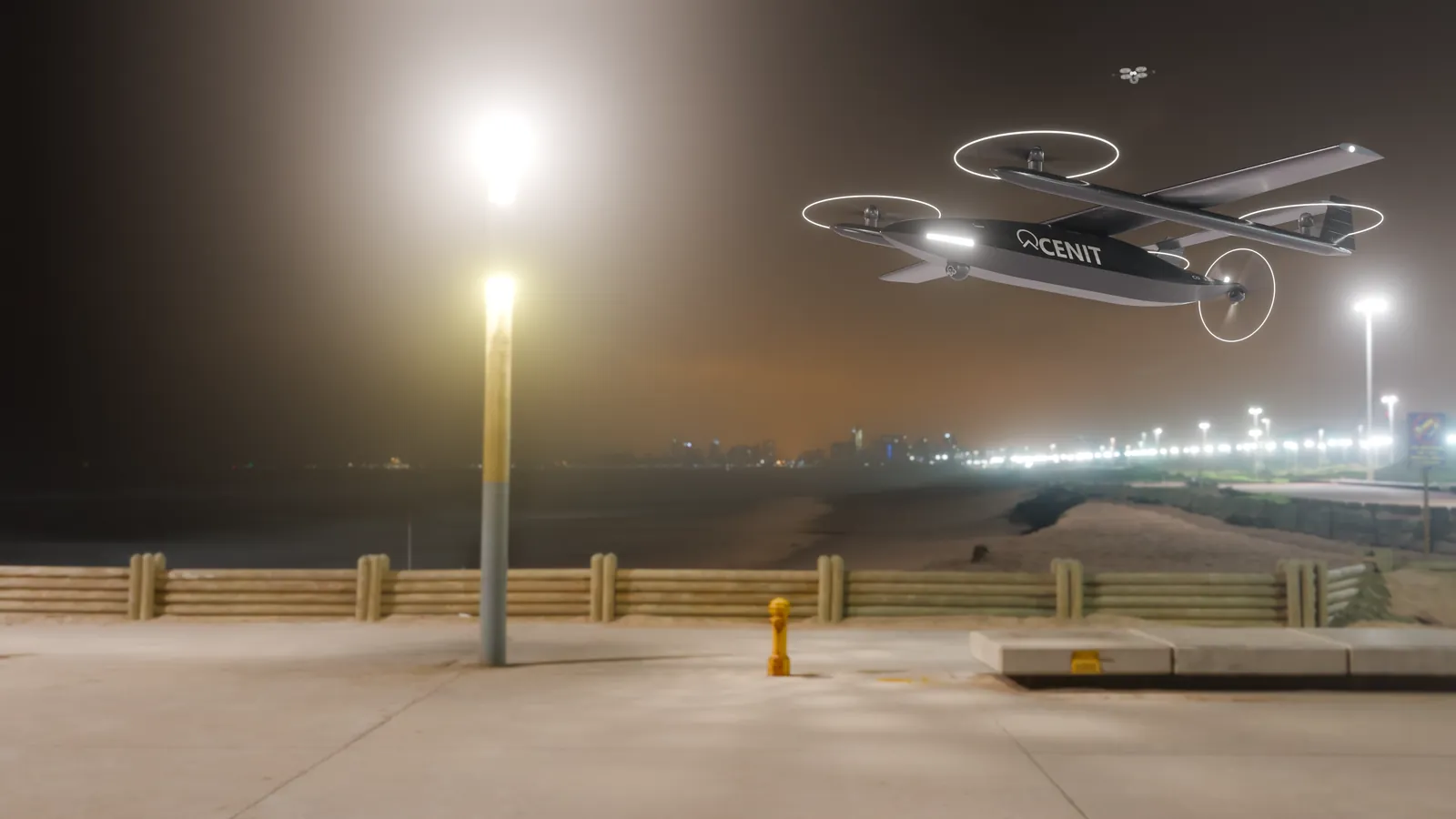 Dron COLIBRÍ de entregas volando de noche sobre la rambla, con la ciudad iluminada al fondo.